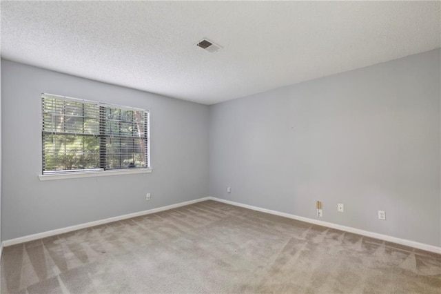 511 Barrington Hills Dr, Atlanta, GA 30350 - carpeted empty room with baseboards and a textured ceiling