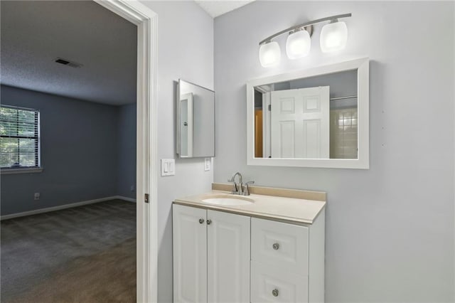 511 Barrington Hills Dr, Atlanta, GA 30350 - bathroom with vanity and a textured ceiling