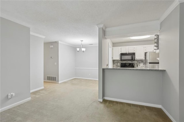 511 Barrington Hills Dr, Atlanta, GA 30350 - kitchen featuring black appliances, crown molding, light carpet, white cabinets, and a chandelier