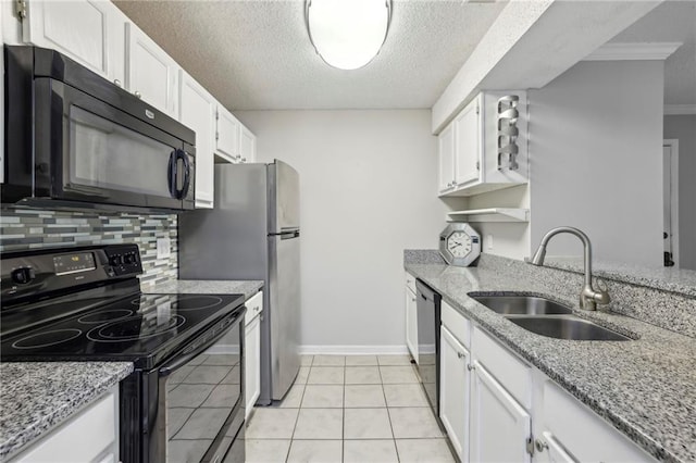 511 Barrington Hills Dr, Atlanta, GA 30350 - kitchen with black appliances, white cabinetry, decorative backsplash, a textured ceiling, and ornamental molding