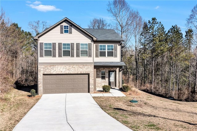 view of front of house with a garage, driveway, and brick siding