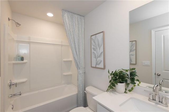 full bathroom featuring shower / bathtub combination with curtain, vanity, and toilet