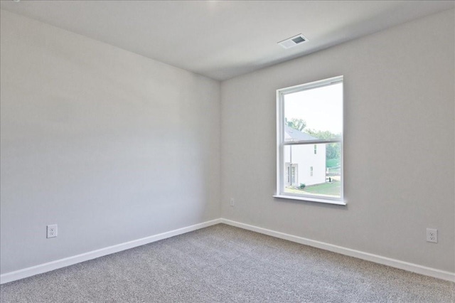 view of carpeted spare room