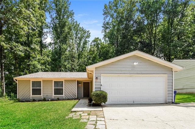 single story home with a garage and a front yard