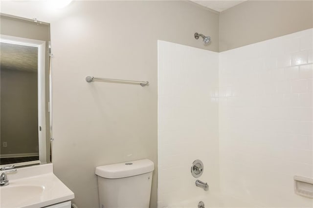 full bathroom featuring vanity, toilet, and bathing tub / shower combination