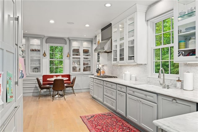 5545 Cross Gate Ct, Atlanta, GA 30327 - kitchen with a sink, decorative backsplash, gray cabinets, light wood-type flooring, and recessed lighting