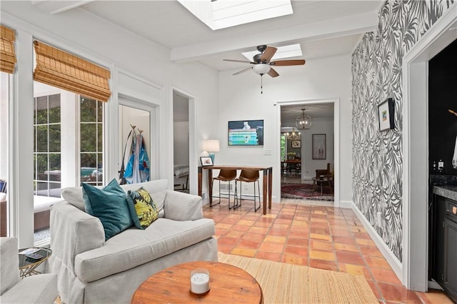 5545 Cross Gate Ct, Atlanta, GA 30327 - living area with beam ceiling, a skylight, light tile patterned flooring, a ceiling fan, and a chandelier