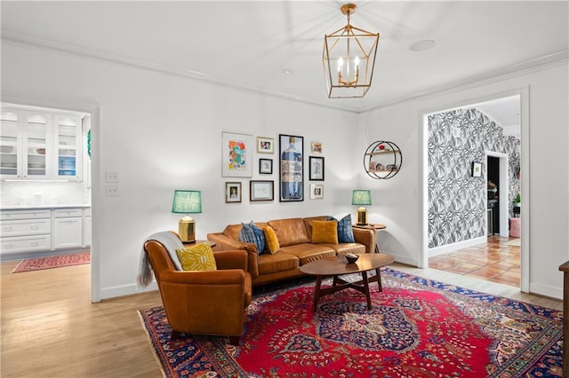 5545 Cross Gate Ct, Atlanta, GA 30327 - living area with crown molding, a chandelier, baseboards, and light wood finished floors