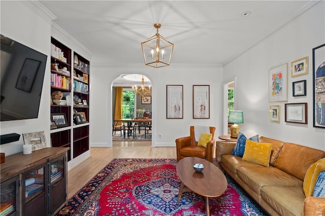 5545 Cross Gate Ct, Atlanta, GA 30327 - living area with a chandelier, arched walkways, wood finished floors, ornamental molding, and baseboards