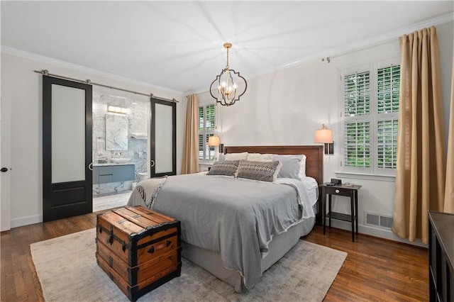 5545 Cross Gate Ct, Atlanta, GA 30327 - bedroom with crown molding, wood finished floors, a chandelier, and baseboards