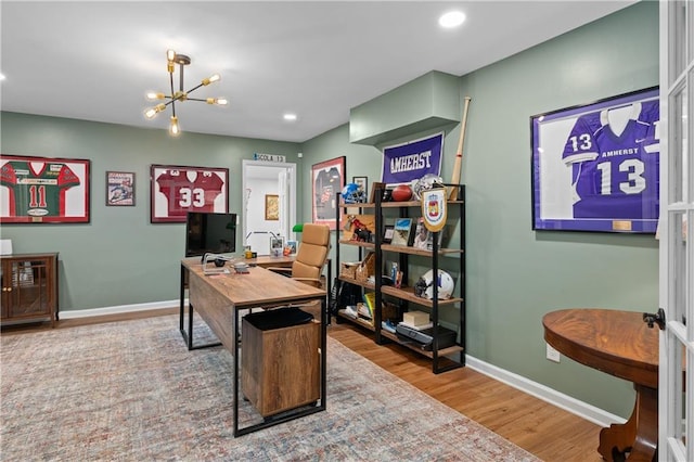 5545 Cross Gate Ct, Atlanta, GA 30327 - home office with wood finished floors, baseboards, a chandelier, and recessed lighting
