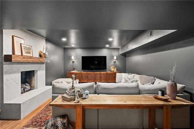 5545 Cross Gate Ct, Atlanta, GA 30327 - living room with wood finished floors, recessed lighting, and a premium fireplace