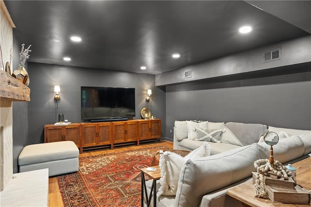 5545 Cross Gate Ct, Atlanta, GA 30327 - living area with wood finished floors, recessed lighting, and a fireplace