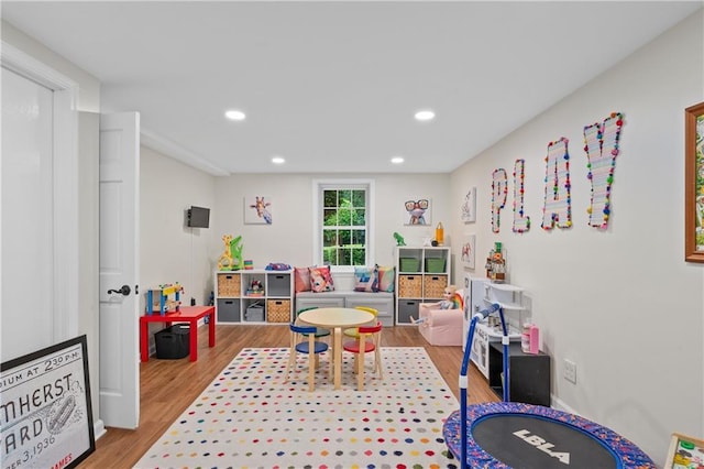 5545 Cross Gate Ct, Atlanta, GA 30327 - recreation room with wood finished floors and recessed lighting