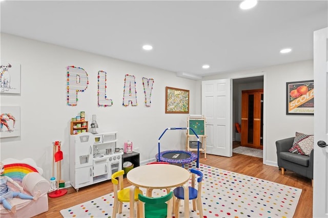 5545 Cross Gate Ct, Atlanta, GA 30327 - game room featuring wood finished floors, recessed lighting, and baseboards