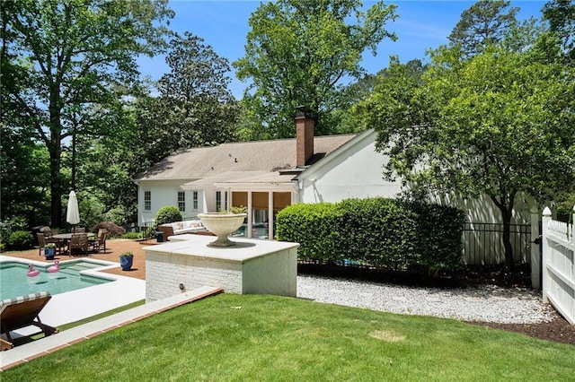 5545 Cross Gate Ct, Atlanta, GA 30327 - rear view of property with a patio and a chimney