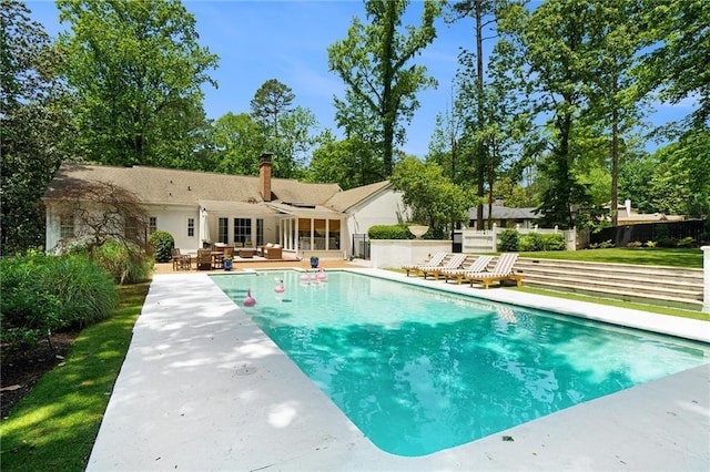 5545 Cross Gate Ct, Atlanta, GA 30327 - outdoor pool featuring an outdoor hangout area and a patio area