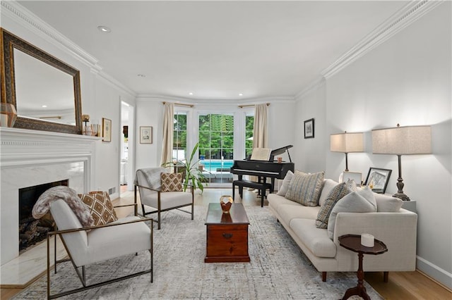 5545 Cross Gate Ct, Atlanta, GA 30327 - living room featuring wood finished floors, ornamental molding, a fireplace, baseboards, and recessed lighting