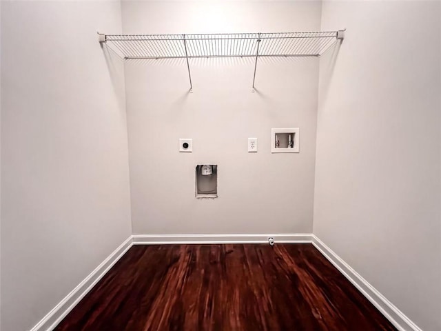 laundry room featuring hookup for a washing machine, hardwood / wood-style floors, and electric dryer hookup