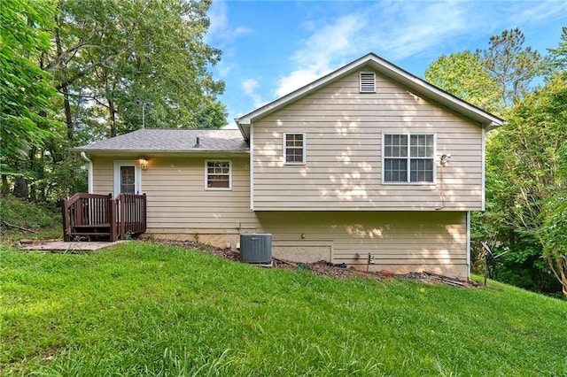 89 Cottonwood Loop, Dallas, GA 30132 - rear view of house featuring a yard and a wooden deck