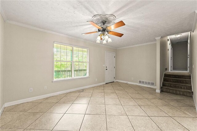 89 Cottonwood Loop, Dallas, GA 30132 - unfurnished room with light tile patterned floors, ceiling fan, ornamental molding, and a textured ceiling