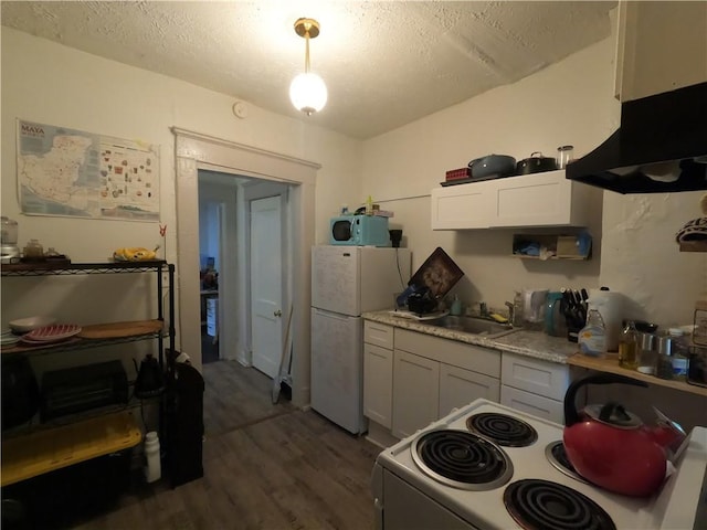 kitchen featuring light stone counters, white appliances, extractor fan, sink, and dark hardwood / wood-style floors