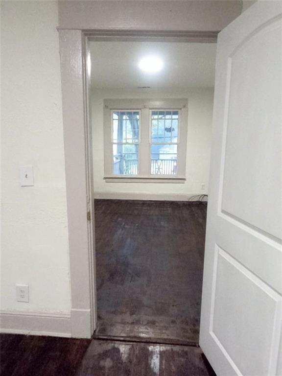 hallway featuring hardwood / wood-style flooring