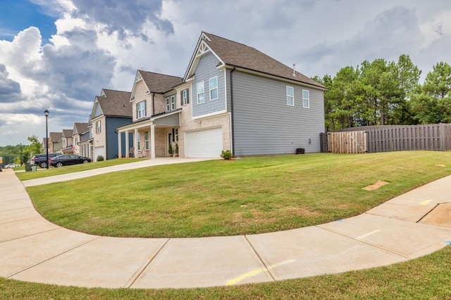 view of property exterior with a lawn and a garage