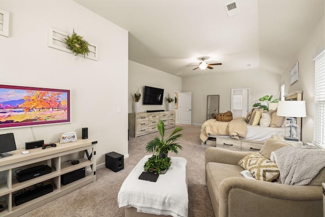 living room featuring ceiling fan and light colored carpet