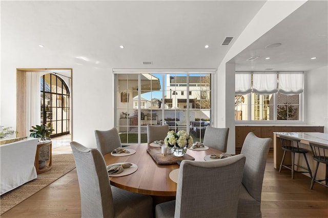 dining room with hardwood / wood-style floors