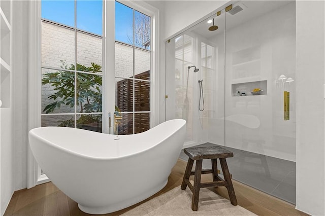 bathroom with independent shower and bath