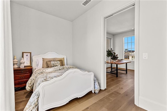 bedroom featuring light hardwood / wood-style flooring