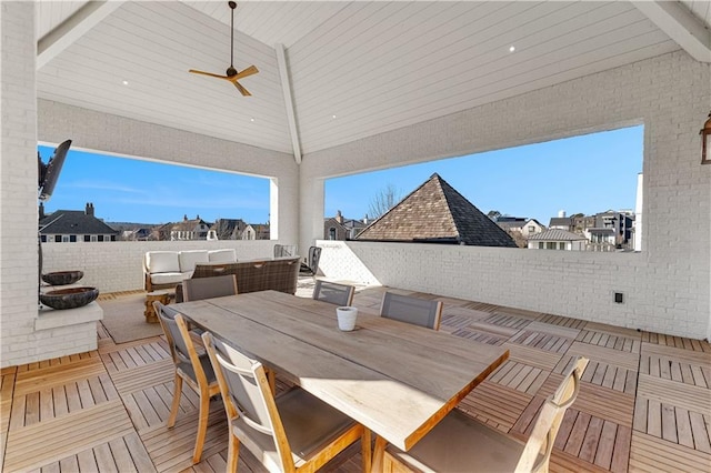 view of patio with an outdoor living space and ceiling fan