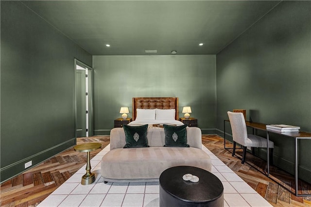 bedroom featuring light parquet flooring