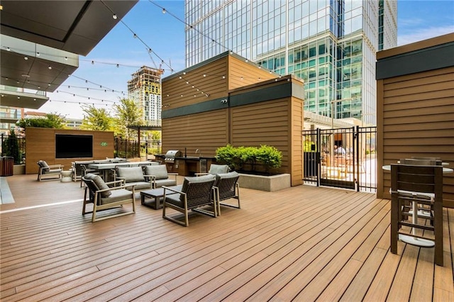 deck with an outdoor hangout area