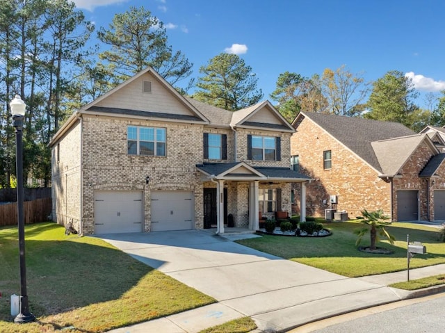 view of front of property with a porch, central AC, a garage, and a front lawn