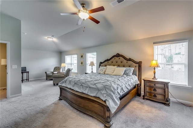 bedroom featuring baseboards, visible vents, a ceiling fan, lofted ceiling, and carpet floors