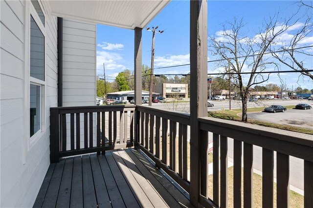 wooden terrace featuring a porch