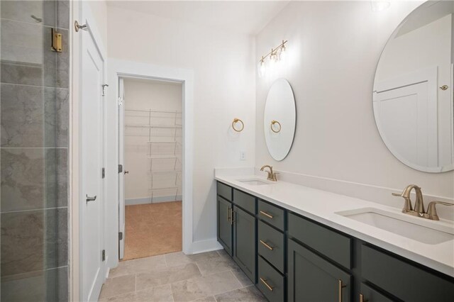 bathroom with vanity and an enclosed shower