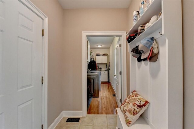 mudroom featuring light tile patterned flooring