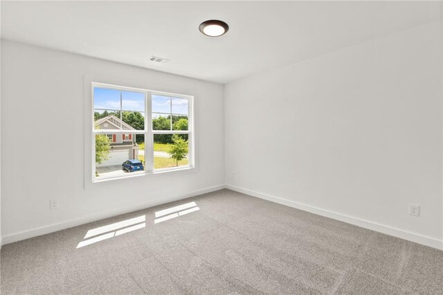 170 Chandler Trce, Covington, GA 30016 - carpeted spare room featuring baseboards