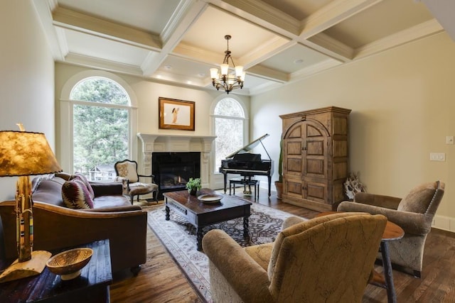5284 Vernon Springs Trl, Sandy Springs, GA 30327 - living area featuring wood finished floors, healthy amount of natural light, a glass covered fireplace, beam ceiling, and coffered ceiling