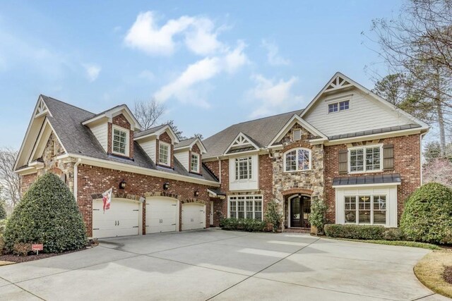 5284 Vernon Springs Trl, Sandy Springs, GA 30327 - view of front of property featuring driveway, brick siding, a shingled roof, and stone siding