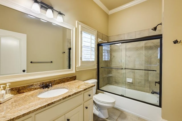 5284 Vernon Springs Trl, Sandy Springs, GA 30327 - bathroom featuring crown molding, vanity, toilet, bath / shower combo with glass door, and tile patterned flooring