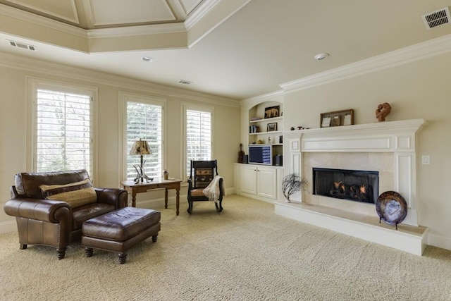 5284 Vernon Springs Trl, Sandy Springs, GA 30327 - sitting room with crown molding, carpet flooring, a glass covered fireplace, and built in shelves