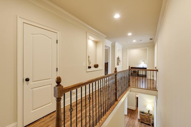 5284 Vernon Springs Trl, Sandy Springs, GA 30327 - corridor featuring an upstairs landing, ornamental molding, wood finished floors, and recessed lighting