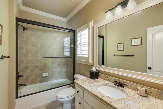 5284 Vernon Springs Trl, Sandy Springs, GA 30327 - bathroom with vanity, toilet, ornamental molding, and combined bath / shower with glass door