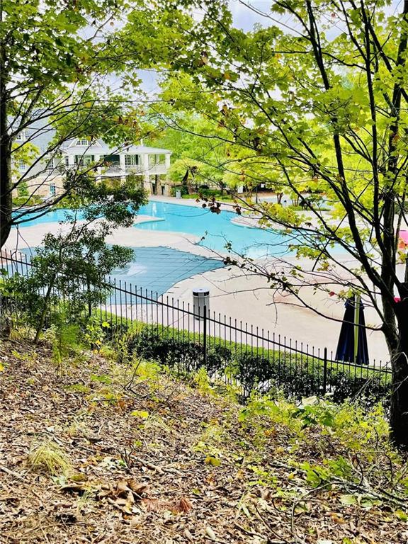 community pool with fence