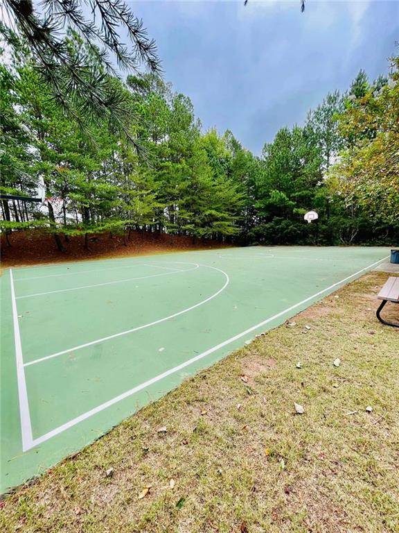 view of basketball court featuring community basketball court