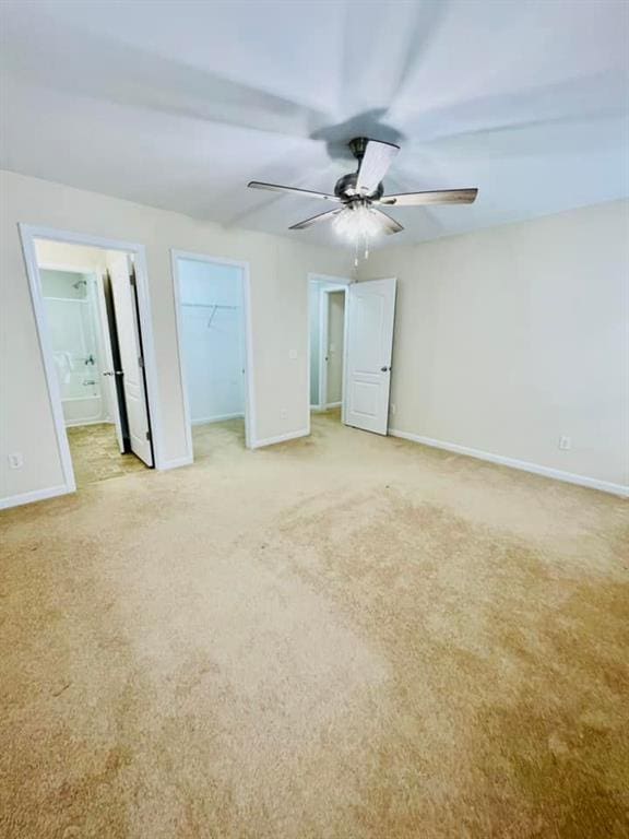 306 Mountain Laurel Walk, Canton, GA 30114 - unfurnished bedroom featuring baseboards, light carpet, and ensuite bath